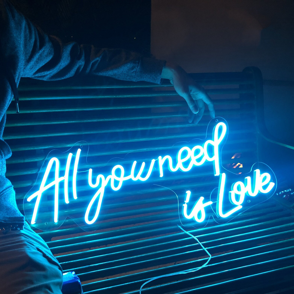 All you need is love neon sign for wedding decor